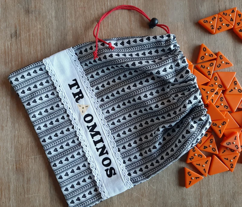 Triominos opbergzak met witte band